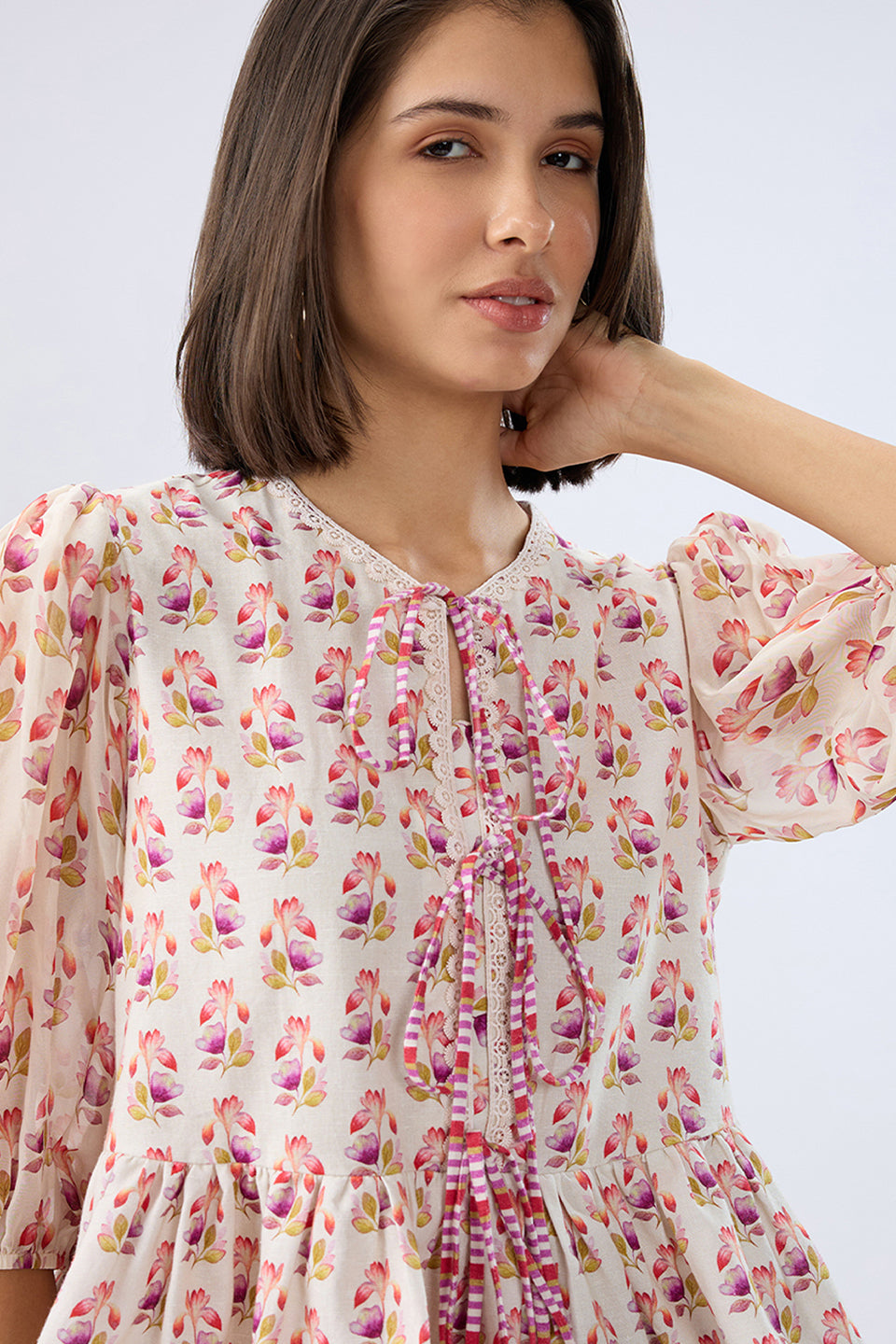 Ivory Floral Tie-up Peplum Top
