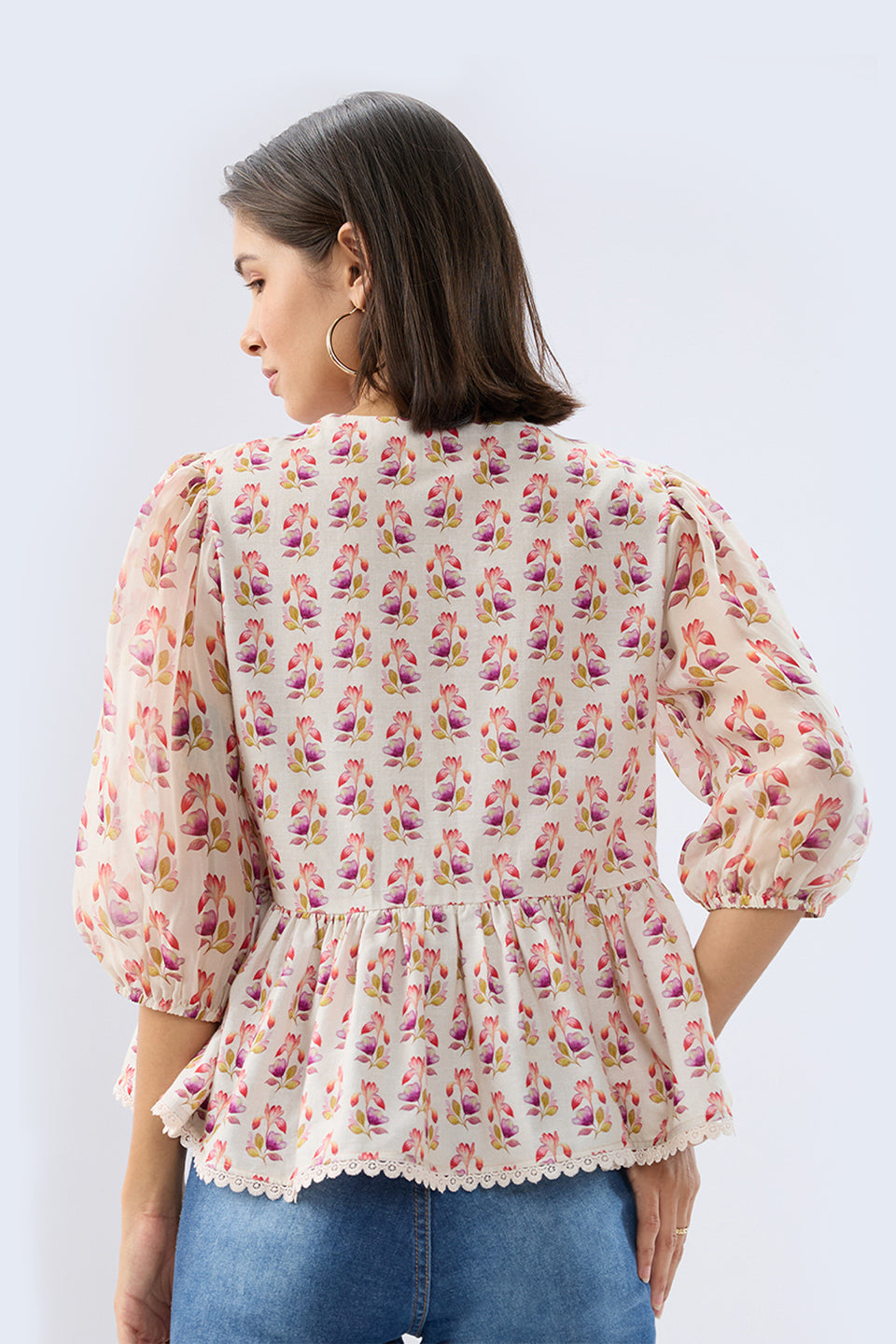 Ivory Floral Tie-up Peplum Top