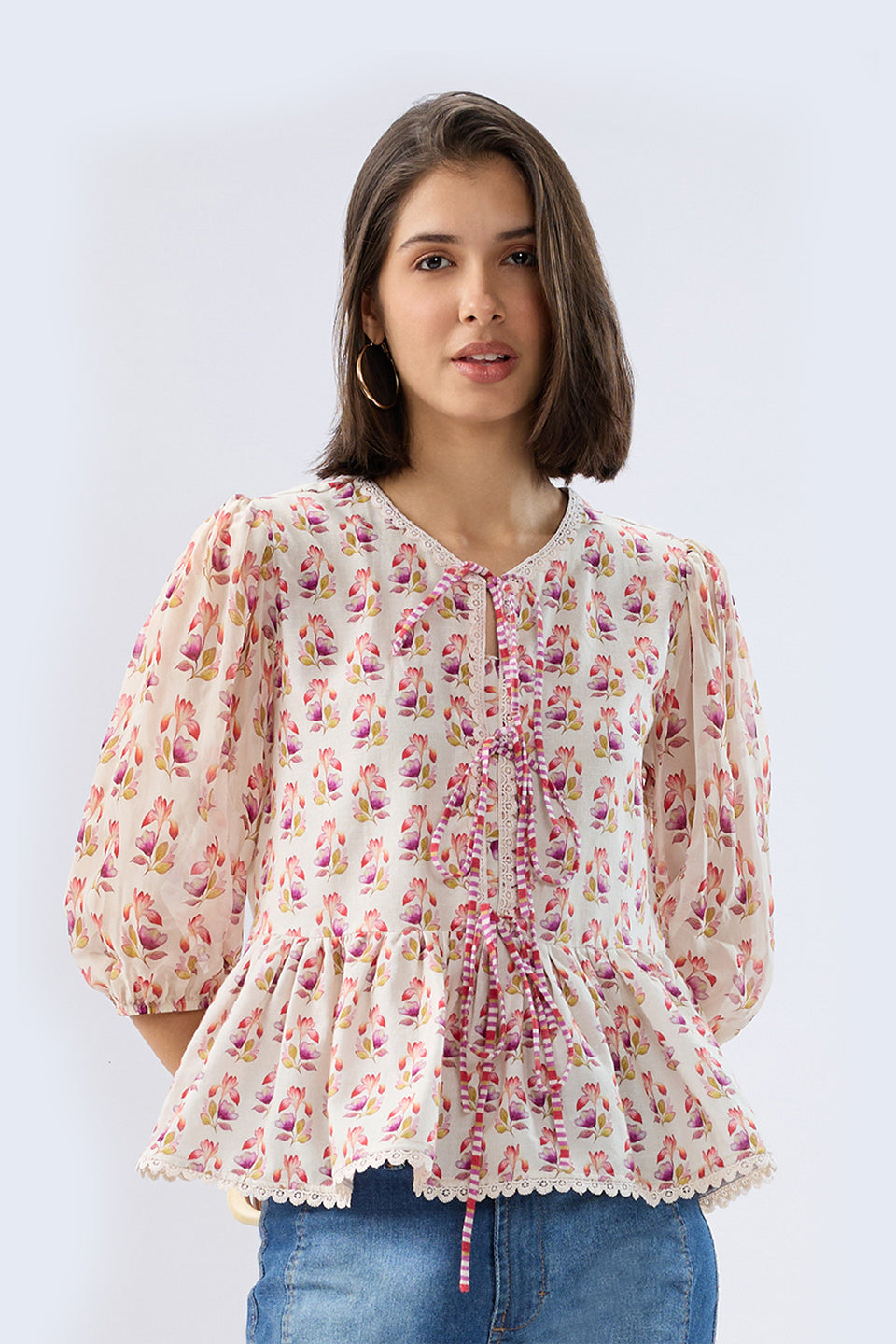 Ivory Floral Tie-up Peplum Top